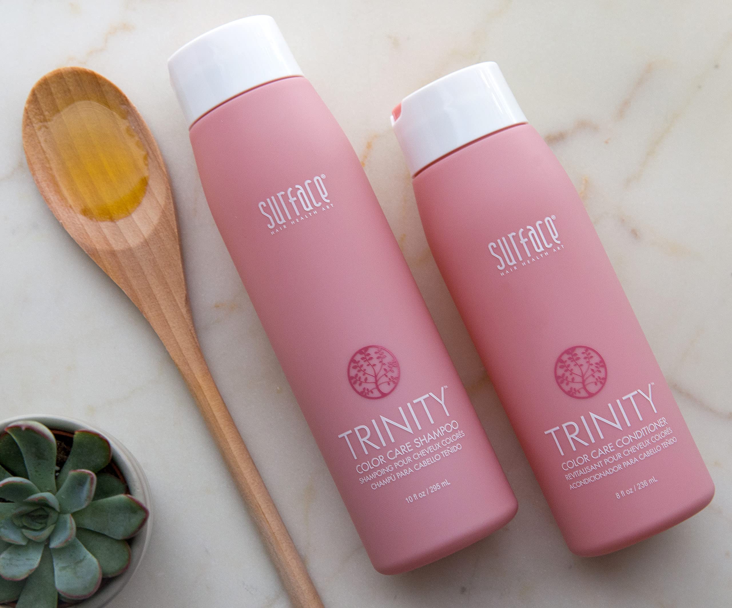 SURFACE Trinity shampoo pump close-up highlighting easy dispensing