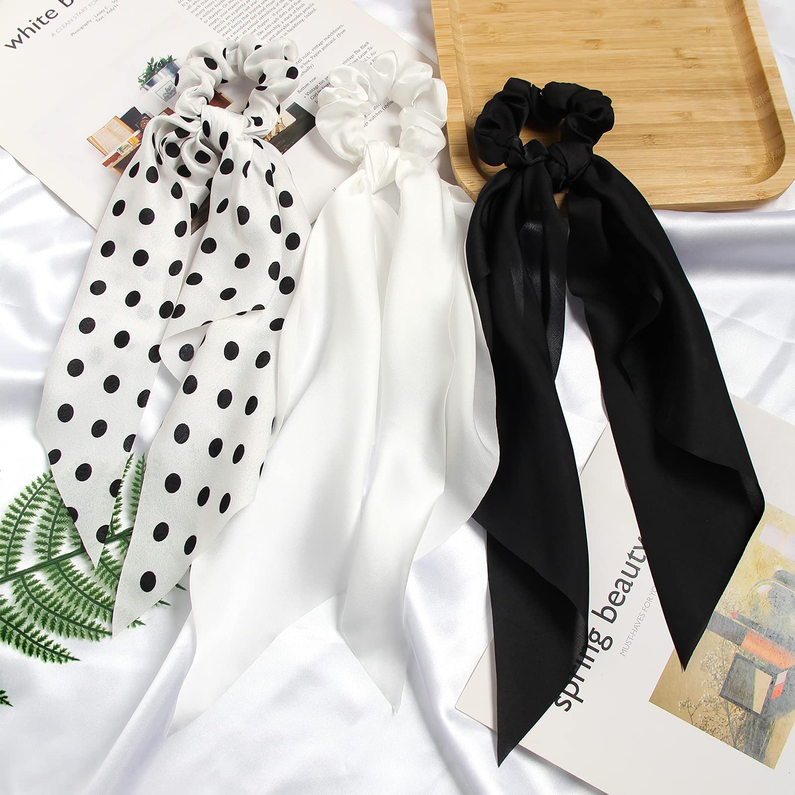SUSULU scrunchie tied around a bun, elegant updo enhancer