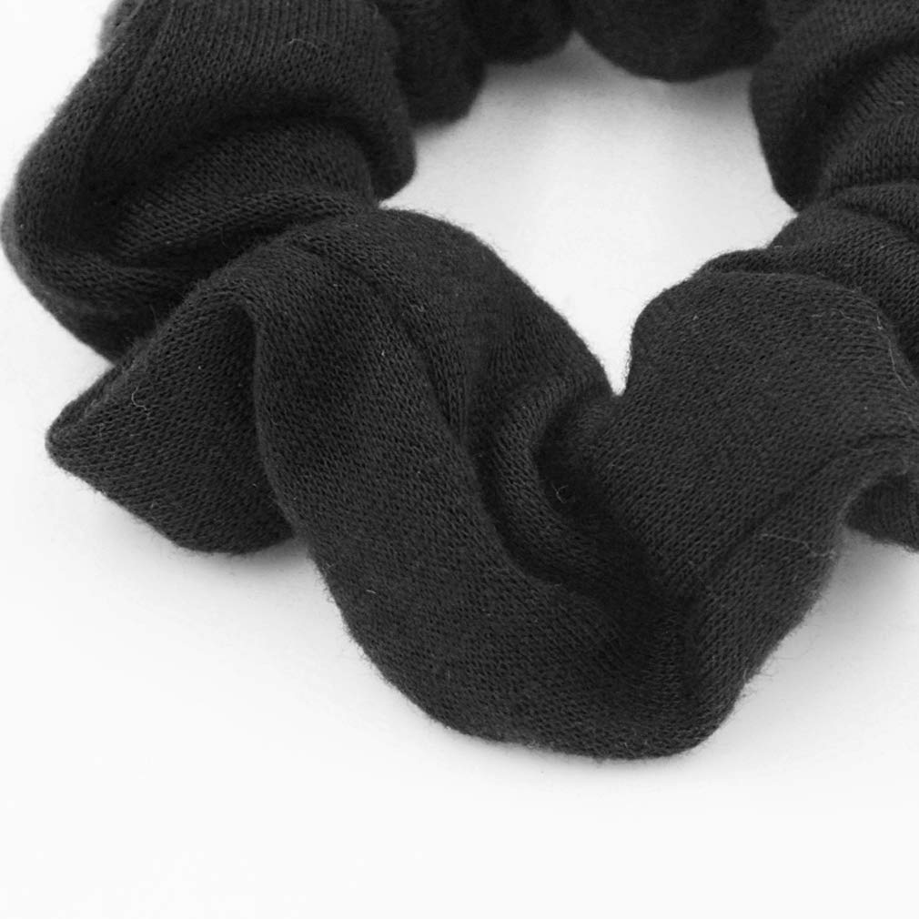 SUSULU worn as ponytail on model demonstrates secure hold and low bulk