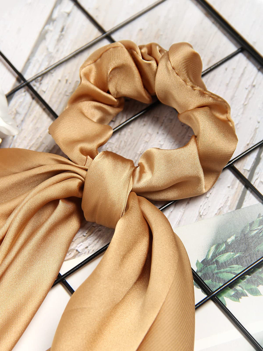 SUSULU worn in a high ponytail demonstrating secure hold and smooth hair appearance