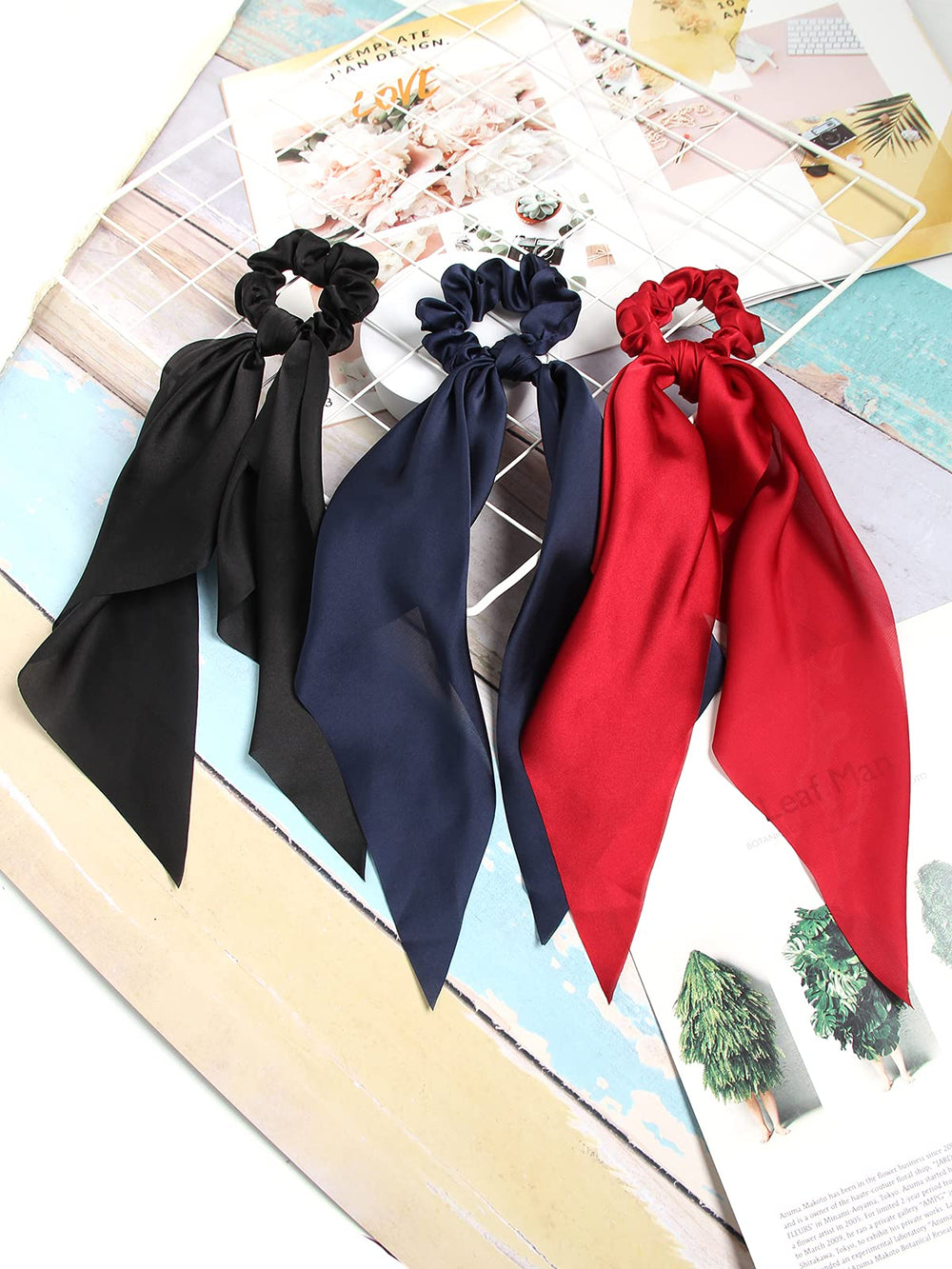 SUSULU bow detail on scrunchie emphasizing decorative tail that upgrades simple ponytails