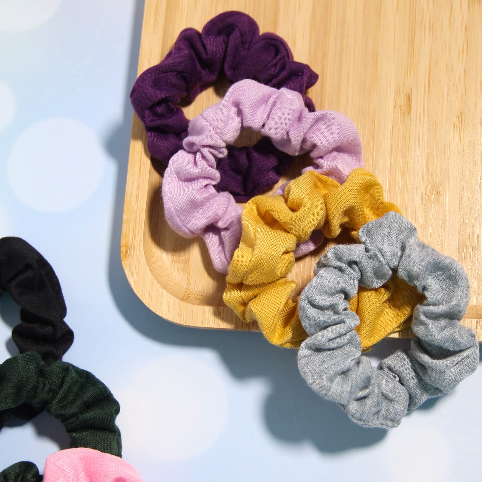 SUSULU single scrunchie close-up highlighting soft fabric and gentle hold