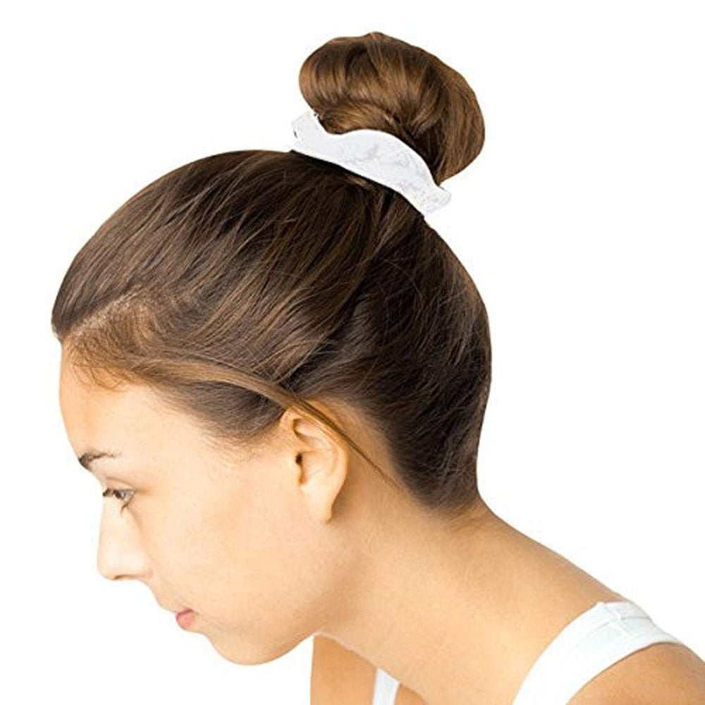 SUSULU scrunchie beside a coin shows size and portability advantage