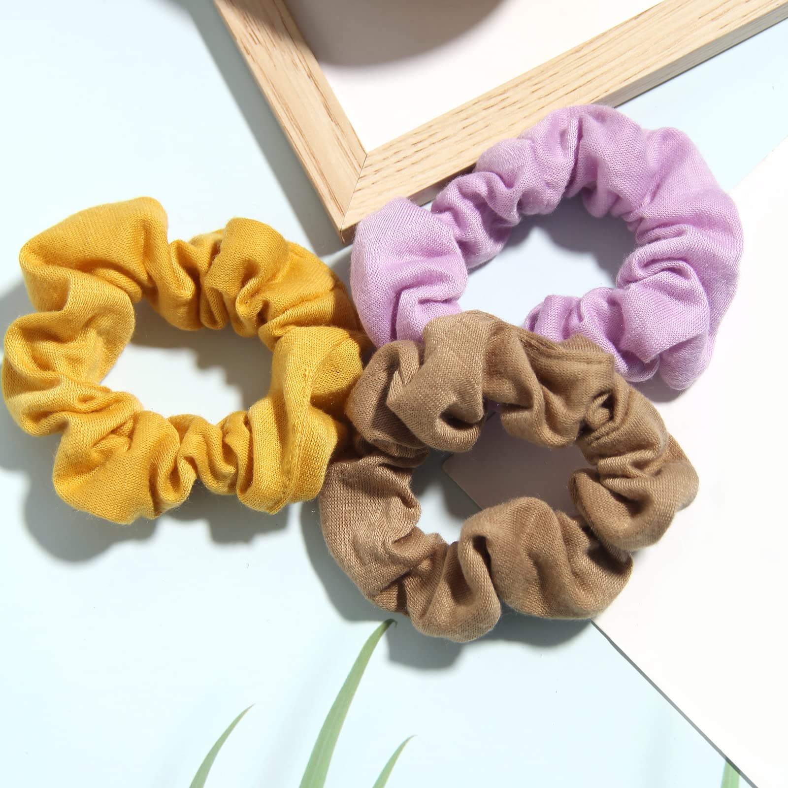 SUSULU scrunchies packed in a travel pouch for on-the-go convenience