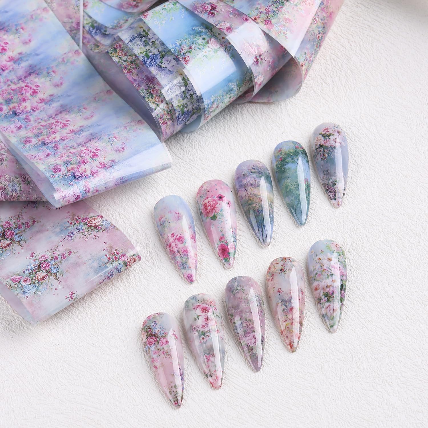 SUTOKAKA finished manicure lifestyle shot displaying floral foils giving polished look