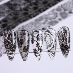 SUTOKAKA white lace designs sheet displaying delicate patterns for classic manicures