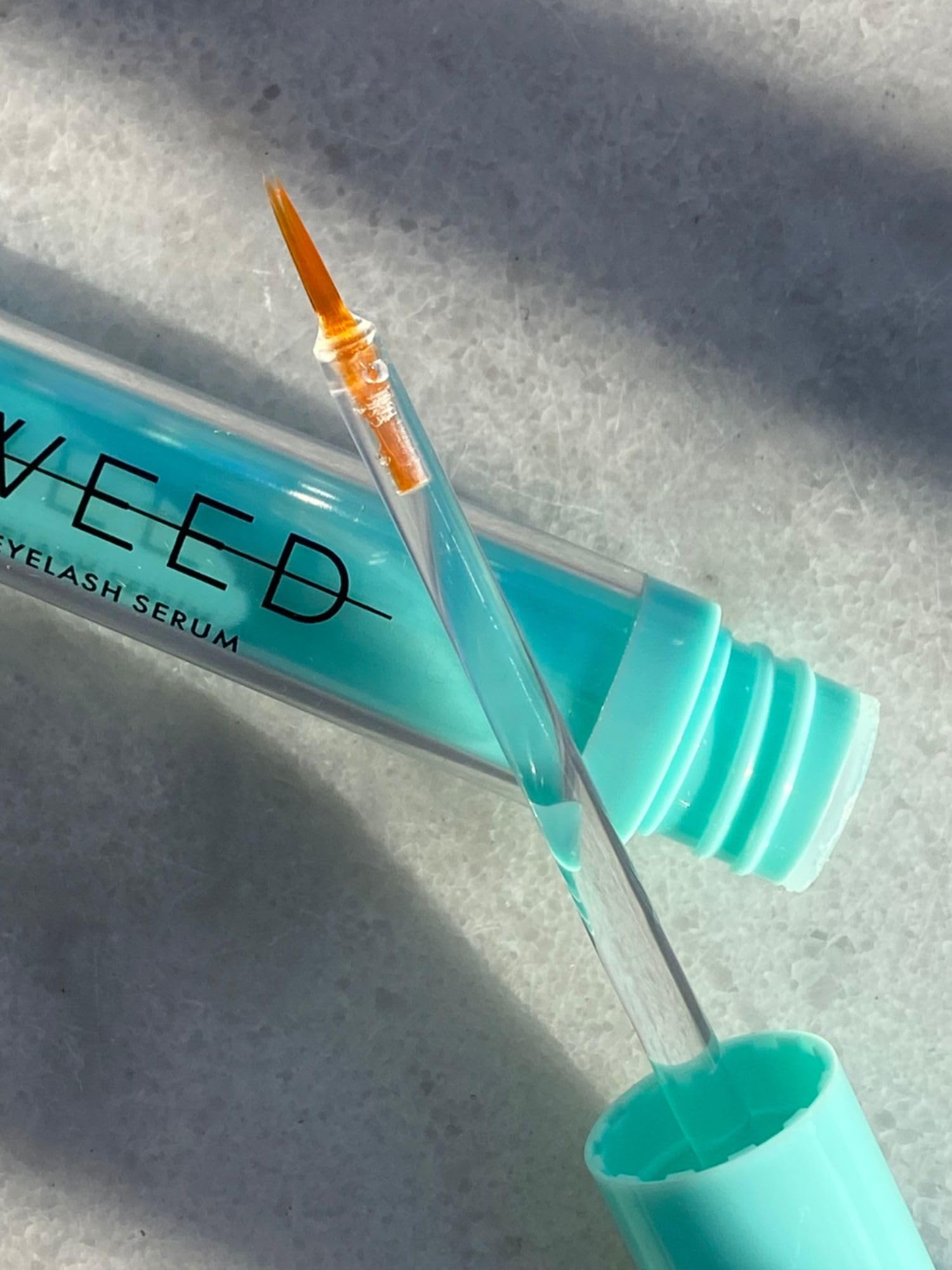 Sweed bottle size scale next to ruler for clear volume and travel-ready benefit
