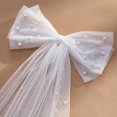 SWEETV tulle layering closeup showing airy volume and wrinkle resistance