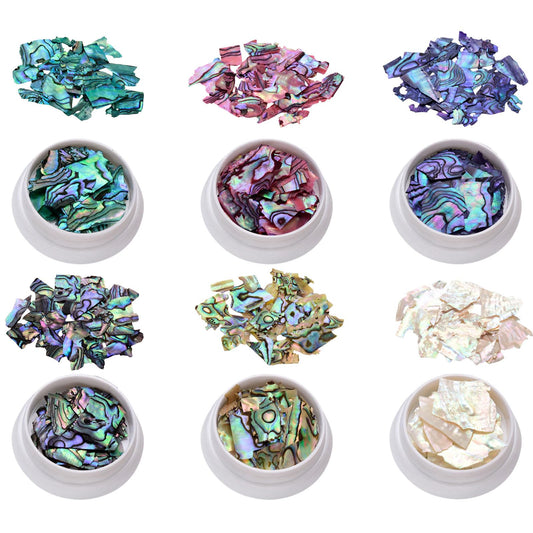 Symphonyw abalone shell flakes front view showing six colorful jars and variety