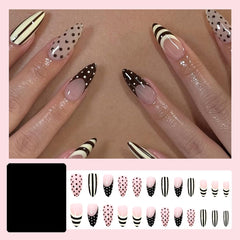 SYPAFG close-up of French tip detailing showing neat polish and playful dots benefit clarity