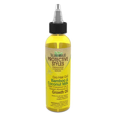 Taliah Waajid oil close-up pour demonstrating lightweight texture and rapid absorption benefit