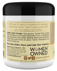 Taliah Waajid applying cream to curls for defined hold
