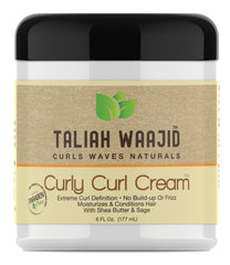 Taliah Waajid jar on bathroom shelf suggesting daily styling routine