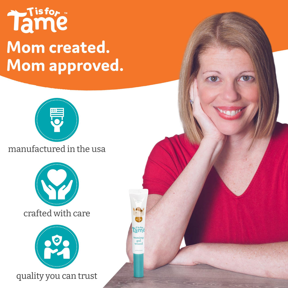 T is for Tame held in hand to show travel-ready size and convenience