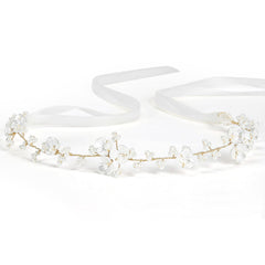 Tanfeine front view of pearl orchid headpiece for elegant event styling