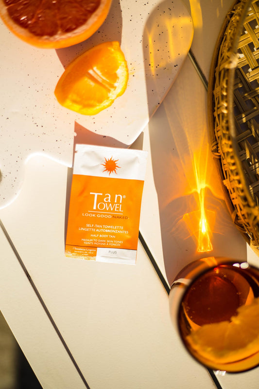 TanTowel close-up of towelette texture and clear formula for smooth application