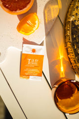 TanTowel close-up of towelette texture and clear formula for smooth application