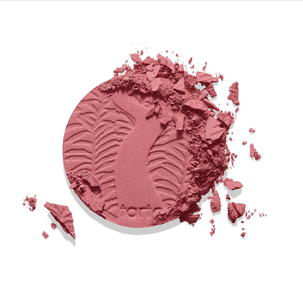tarte blush being picked up with brush for precise application and controlled buildability
