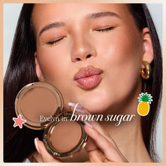 tarte baked powder surface close-up highlighting fine-milled luminosity and buildable warmth