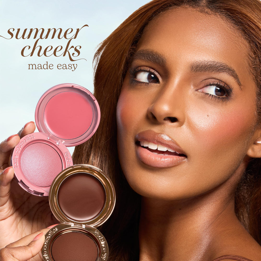 tarte compact held in hand to show travel-friendly size and easy portability benefit