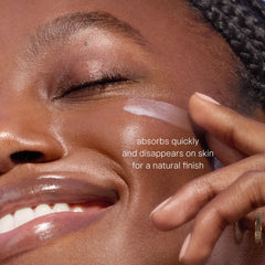 TATCHA sunscreen blended on skin showing invisible finish and no white cast