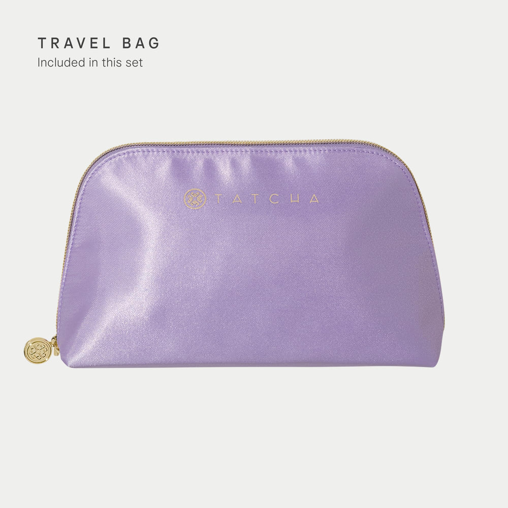 TATCHA travel pouch placed on hotel counter conveying easy travel ritual