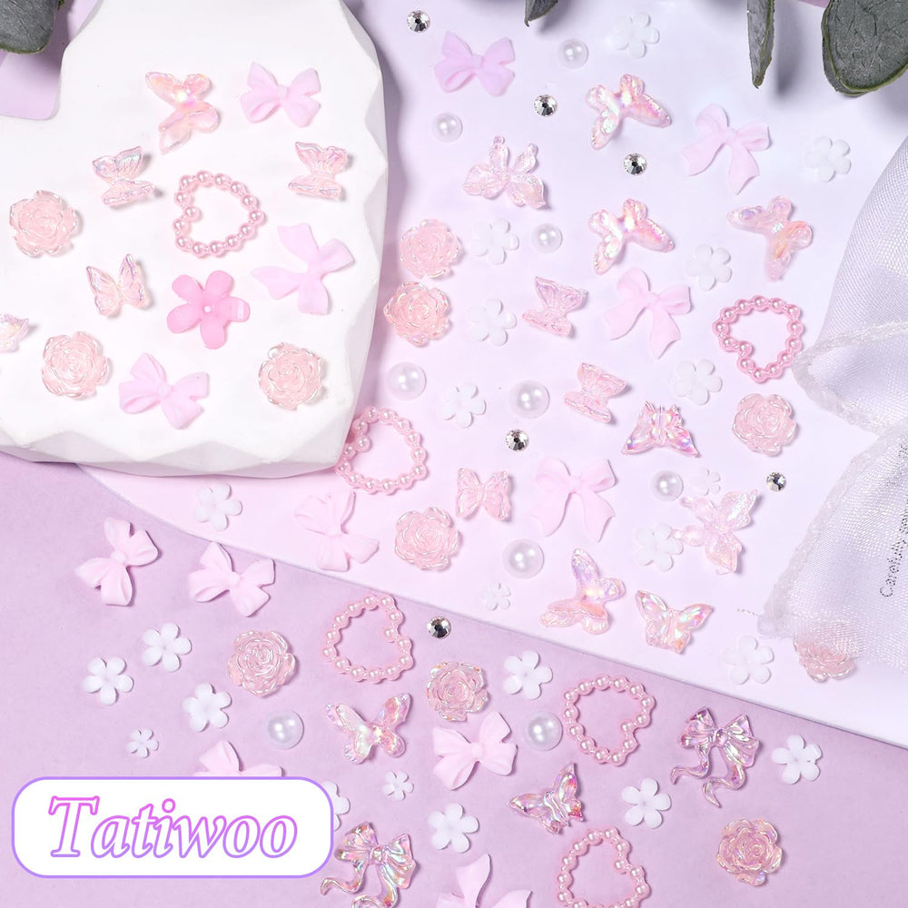 Tatiwoo hand holding charms showing scale and easy application