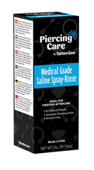 Tattoo Goo label close-up showing 99.9% sodium chloride clarity and usage info