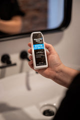 Tattoo Goo spray nozzle close-up showing precise mist for gentle cleansing