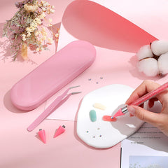 Tatuo picker set in use on nails showing fast rhinestone application