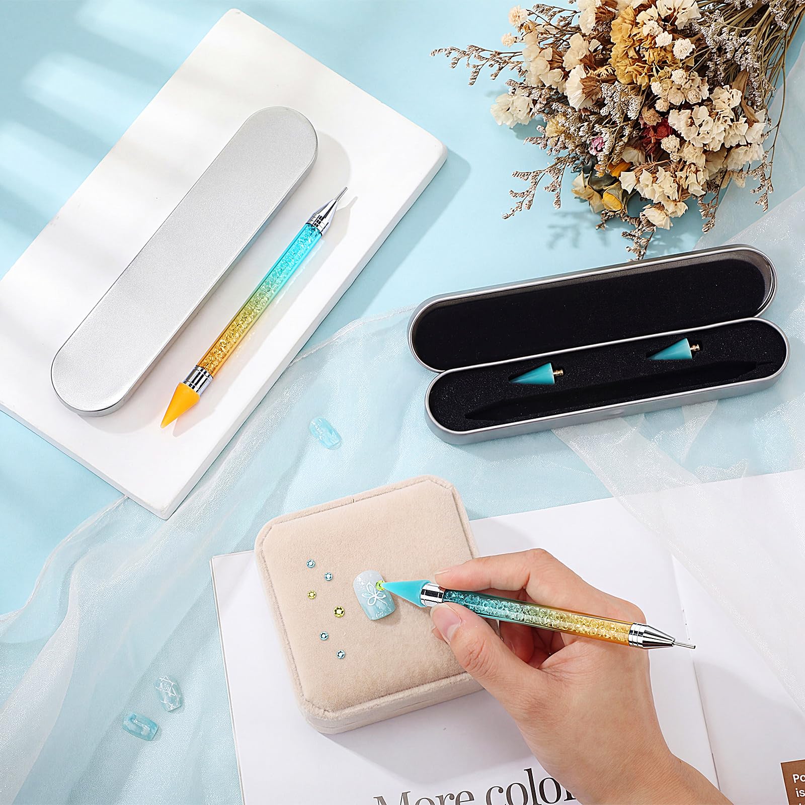 Tatuo in-use lifestyle shot placing rhinestones on nails for quick decorative results