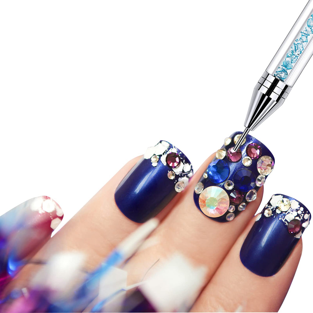 Tatuo placing a crystal on an acrylic nail for neat decorative results
