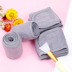 TDHDIKE headband next to hand showing scale and adjustable fit for comfort