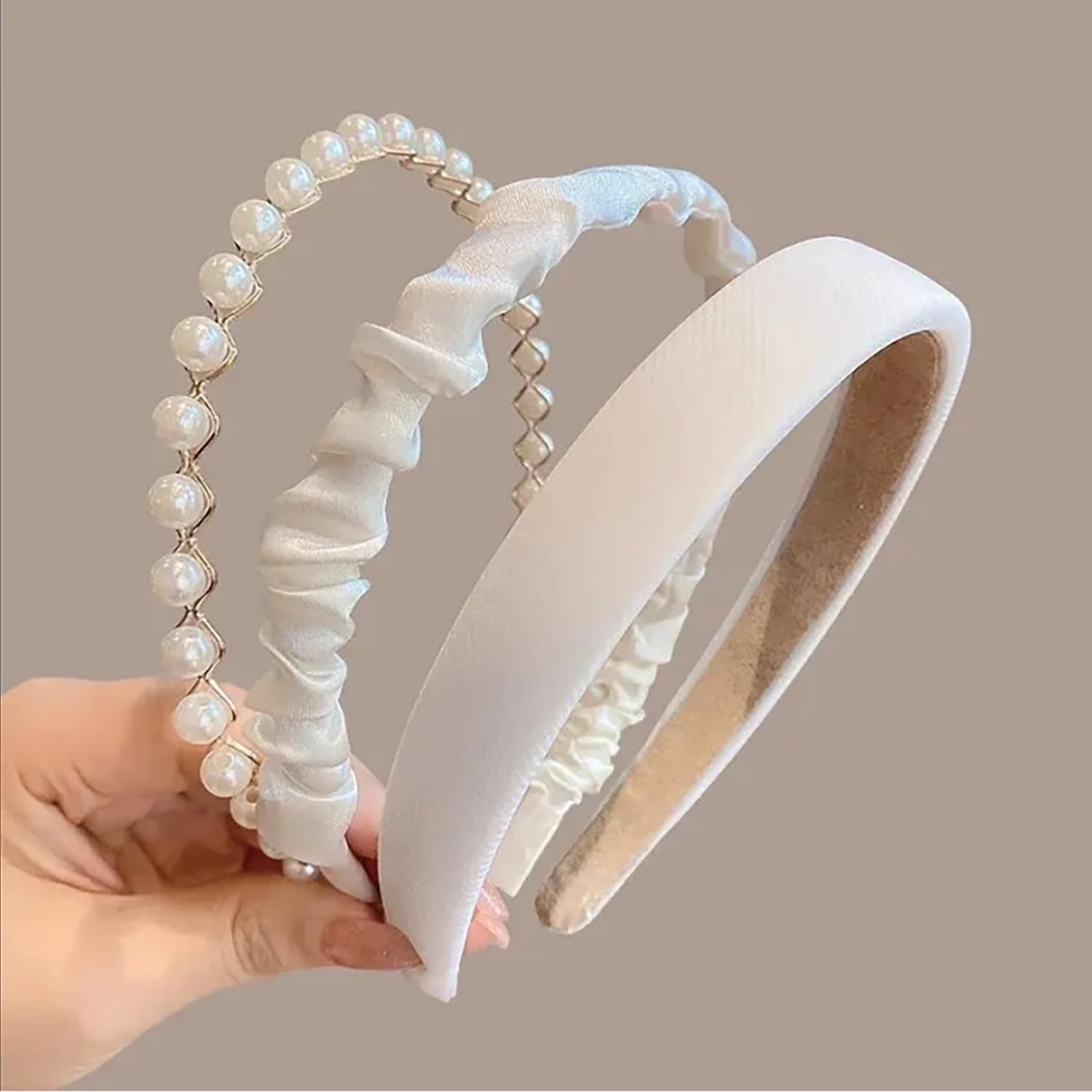 TEBIEKOY front view of three white pearl headbands showing elegant set and benefit