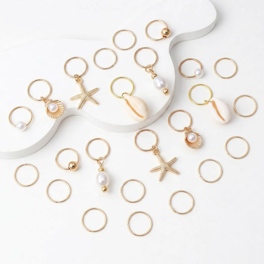 TEBIEKOY detailed close-up of starfish shell and conch charms, shows craftsmanship