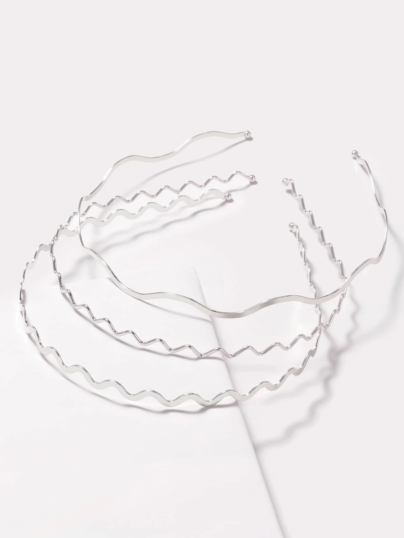 TEBIEKOY front view of three silver wavy headbands showing polished finish and versatility