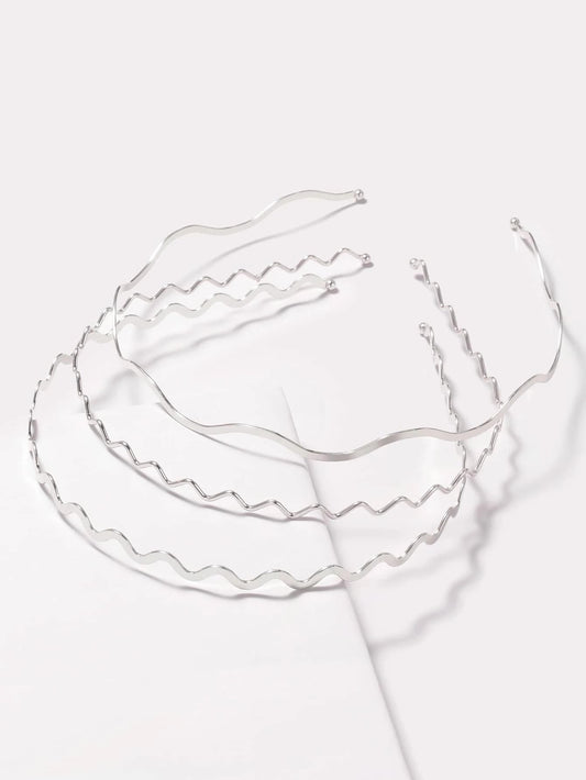 TEBIEKOY front view of three silver wavy headbands showing polished finish and versatility