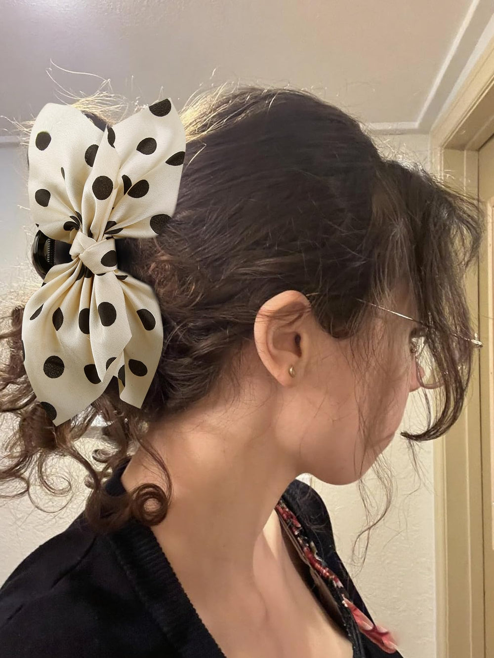 TEBIEKOY used as two clips in a half-up look adding volume and charm