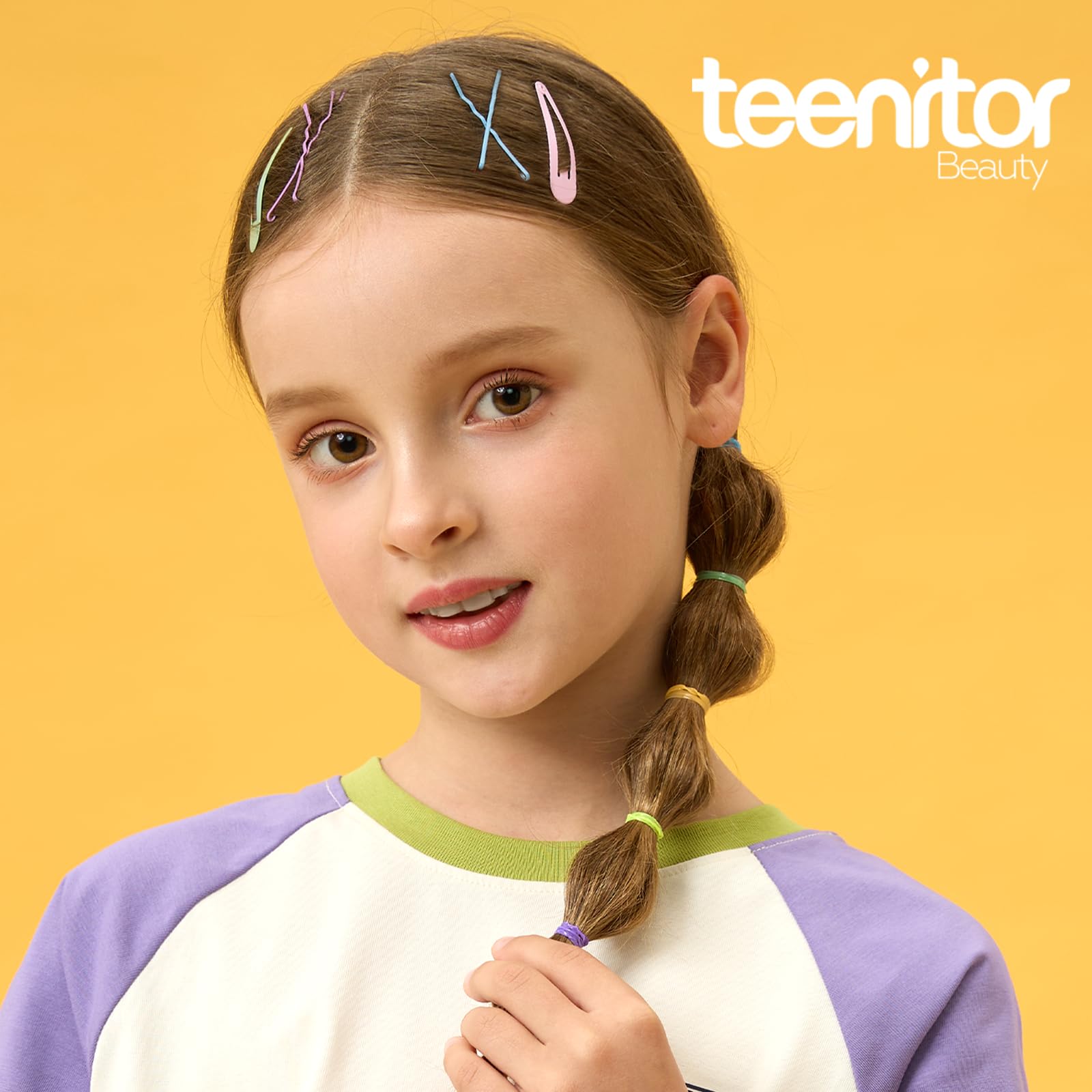 Teenitor toddler wearing a neat ponytail using elastics for gentle hold