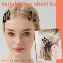 Teenitor clips held in hand to show 2-inch scale and convenient portability