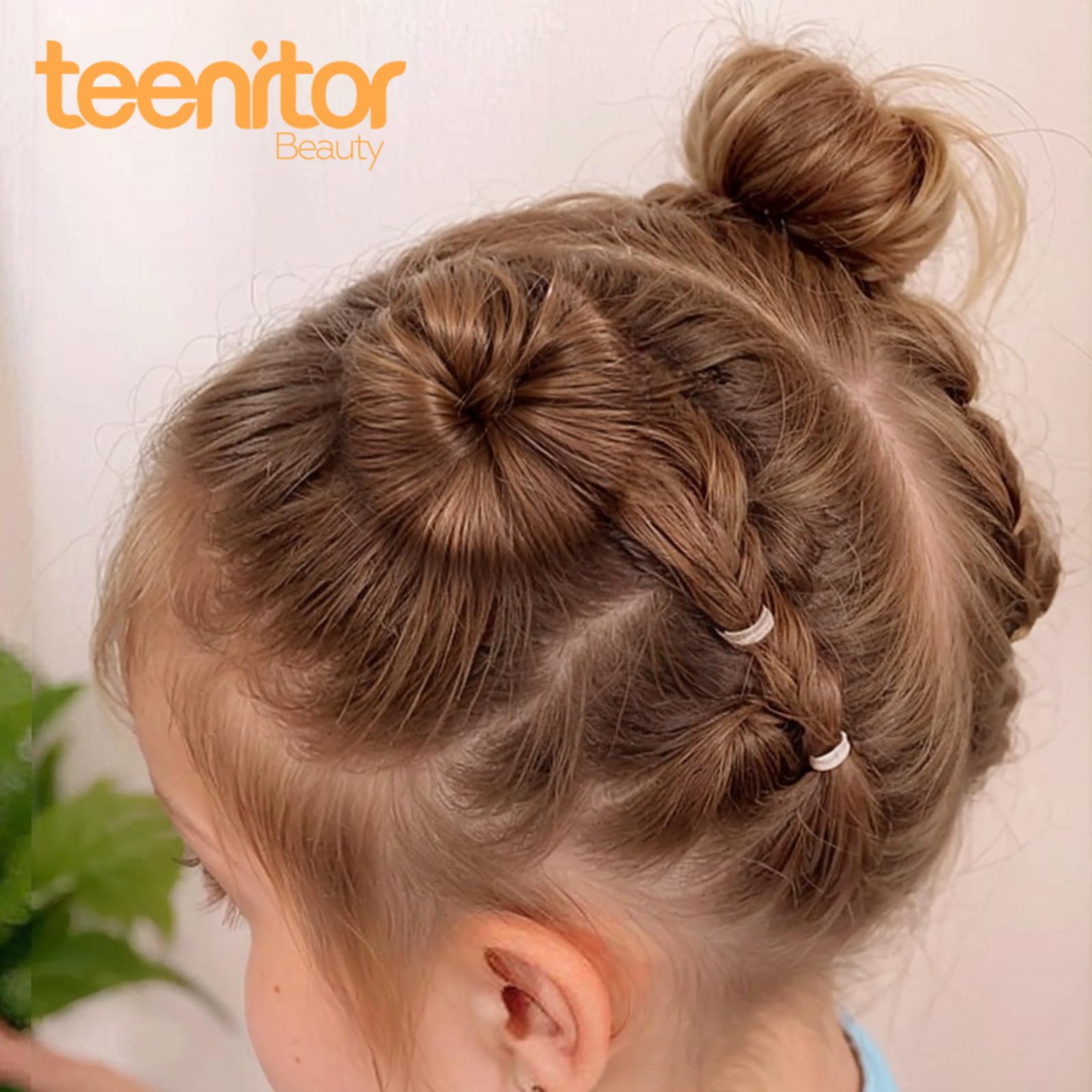 Teenitor elastics and bobby pins laid out for quick secure styling on the go