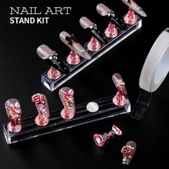 Teenitor tweezers and wax pencil placing a rhinestone to improve placement control