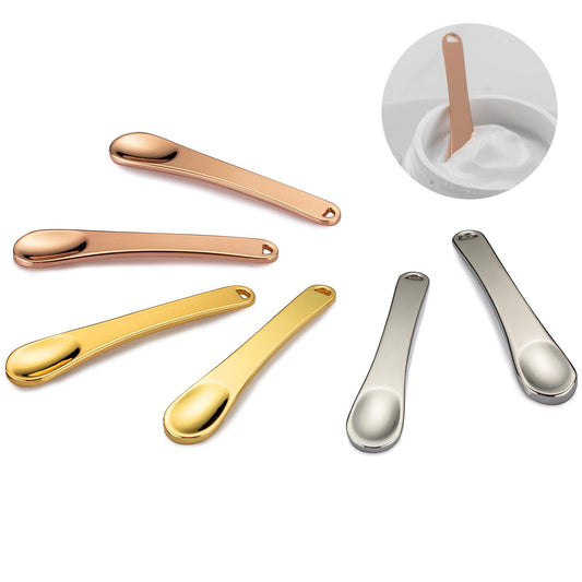 Tekson front view of six metal spatulas showing colors and neat storage benefit