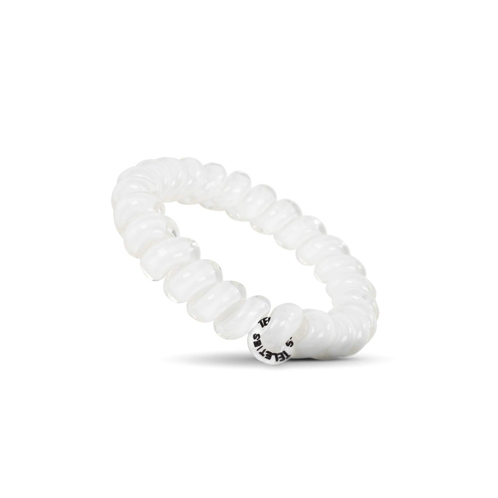 Teleties coconut white in hair ponytail demonstrating secure hold for active movement