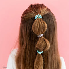 Teleties tiny hair ties beside a coin showing size and gentle-hold benefit