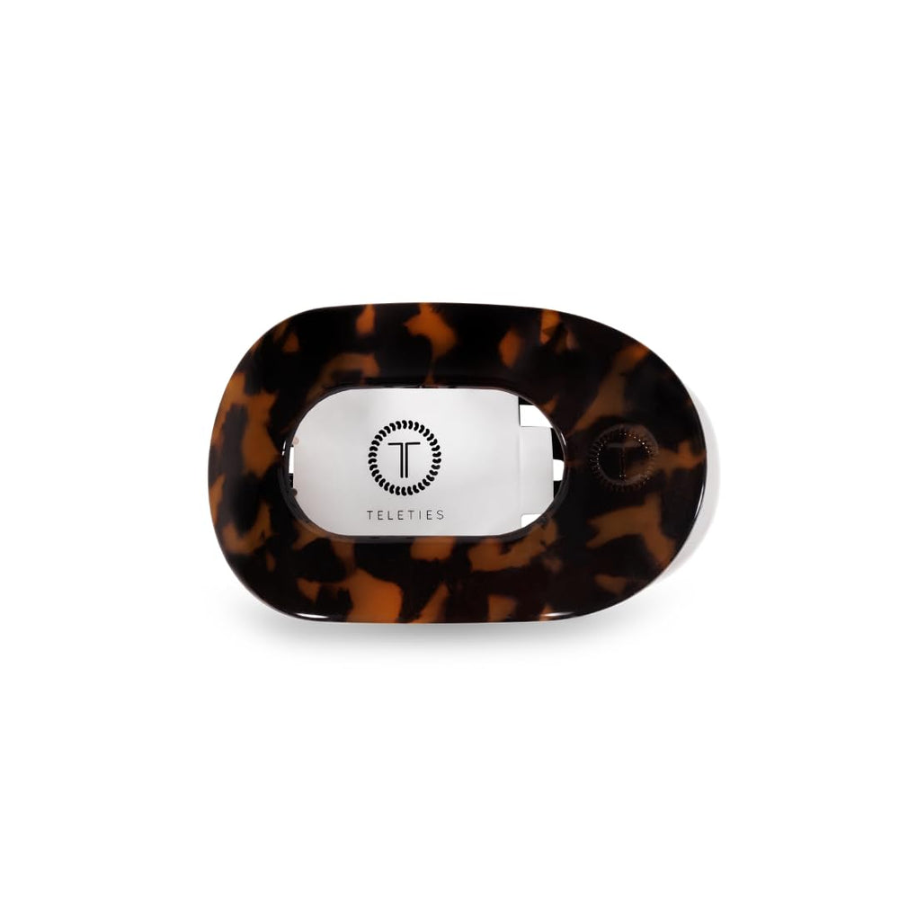 TELETIES flat round clip front view showing tortoise finish and comfortable hold