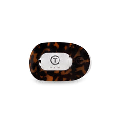 TELETIES small flat round clip front view showing tortoise finish and secure grip