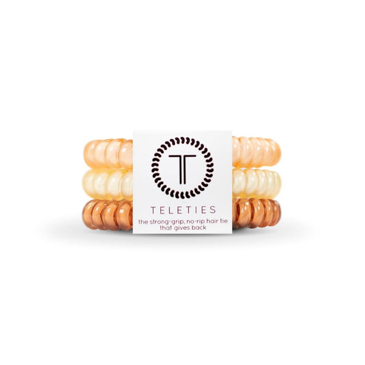 TELETIES front packaging showing three small nude coils and benefits