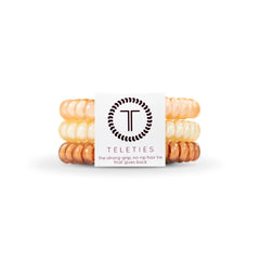 TELETIES front packaging showing three small nude coils and benefits