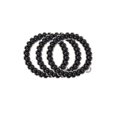 Teleties jet black close‑up of spiral detail highlighting firm flexible grip
